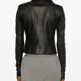 Black jacket worn by a person, showing the jacket fit