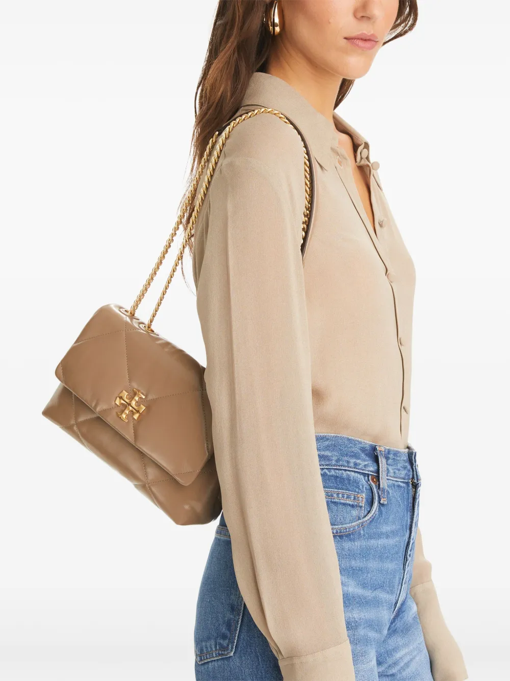 Tan bags worn by a person, showing the bags fit