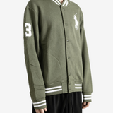 Green jacket worn by a person, showing the jacket fit