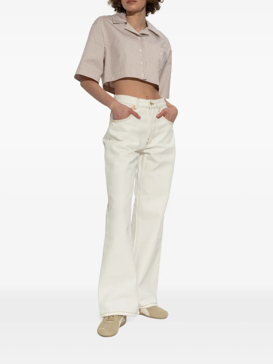 Tan shoes worn by a person, showing the shoes's fit