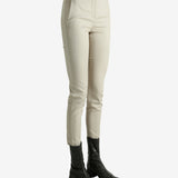 Tan pants worn by a person, showing the pants fit