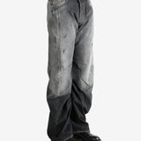 Black jeans worn by a person, showing the jeans fit