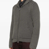 Grey hoodie worn by a person, showing the hoodie fit