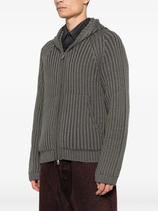 Grey hoodie worn by a person, showing the hoodie fit