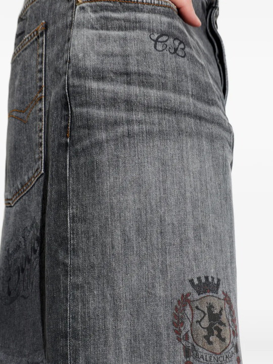 Close up of grey pants, showing texture of the cotton fabric