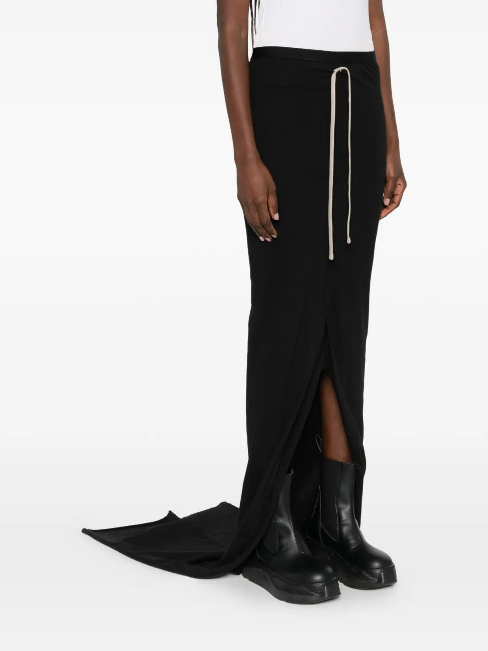 Black skirts worn by a person, showing the skirts fit