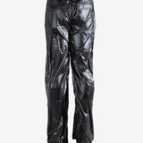 Black pants worn by a person, showing the pants' fit