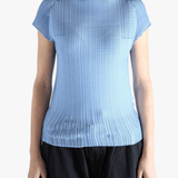 Blue t-shirt worn by a person, showing the t-shirt's fit