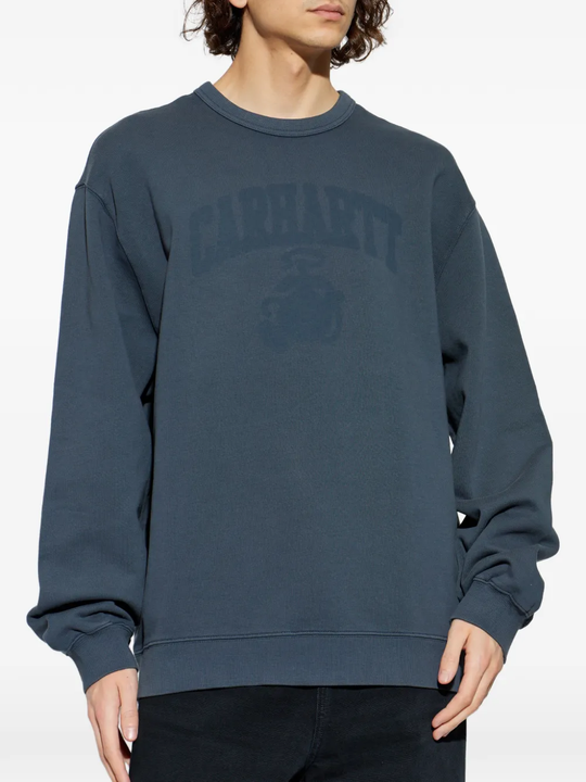 blue sweat, worn by a person, showing the sweat fit