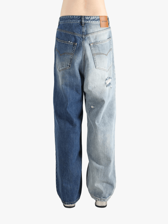 blue jeans worn by a person, showing the jeans  fit