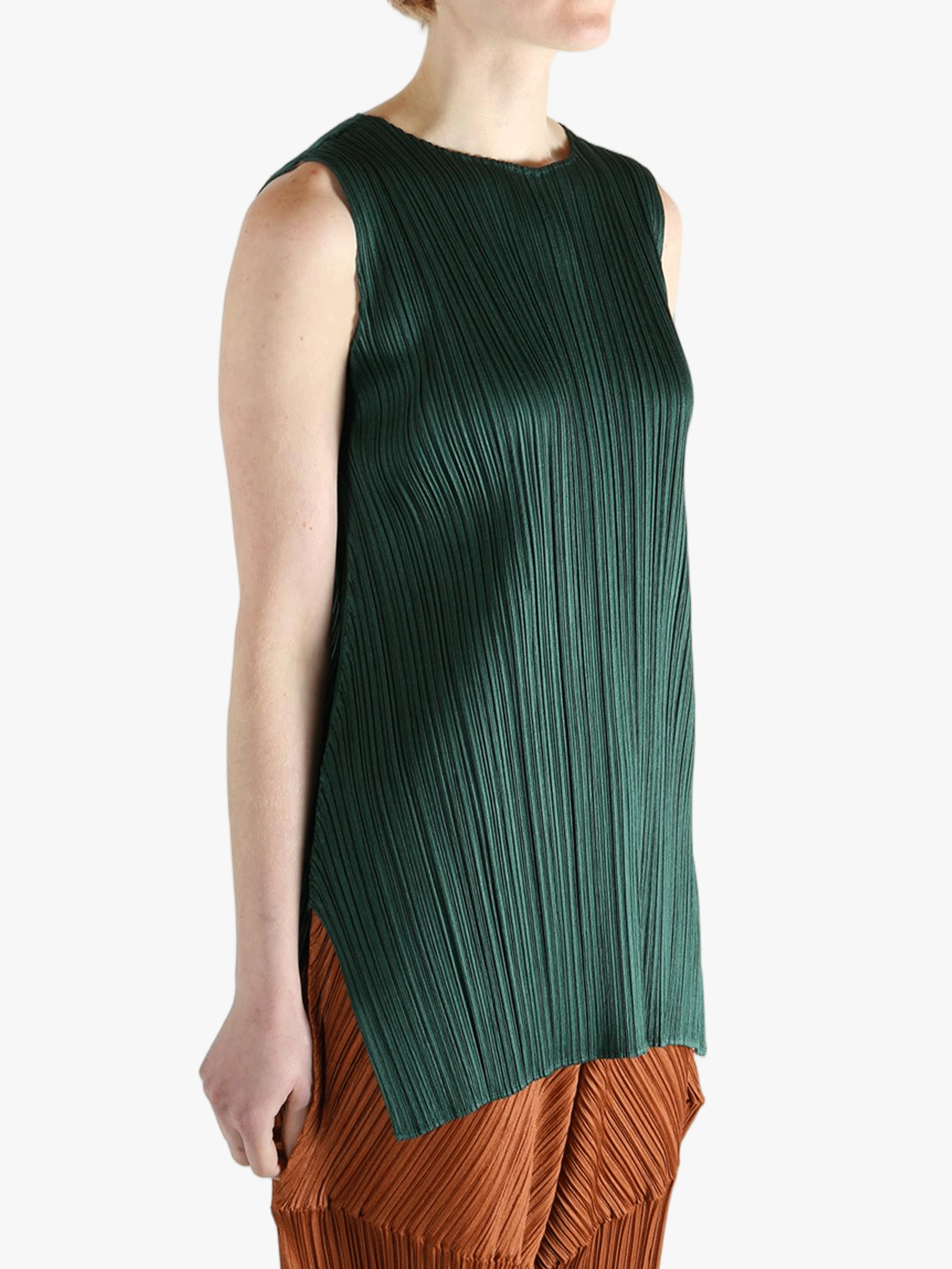 Green dress worn by a person, showing the dress's fit