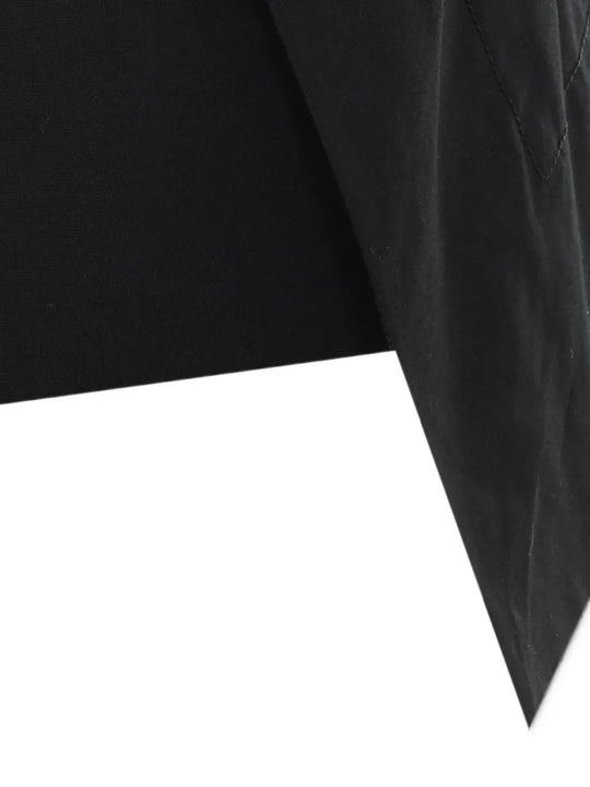 Close up of Black skirt, showing texture of the 100% polyester fabric