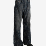 Black jeans worn by a person, showing the jeans' fit