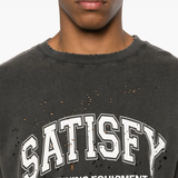 Close up of black shirt, showing texture of the cotton fabric