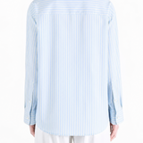 Blue shirt, full body view