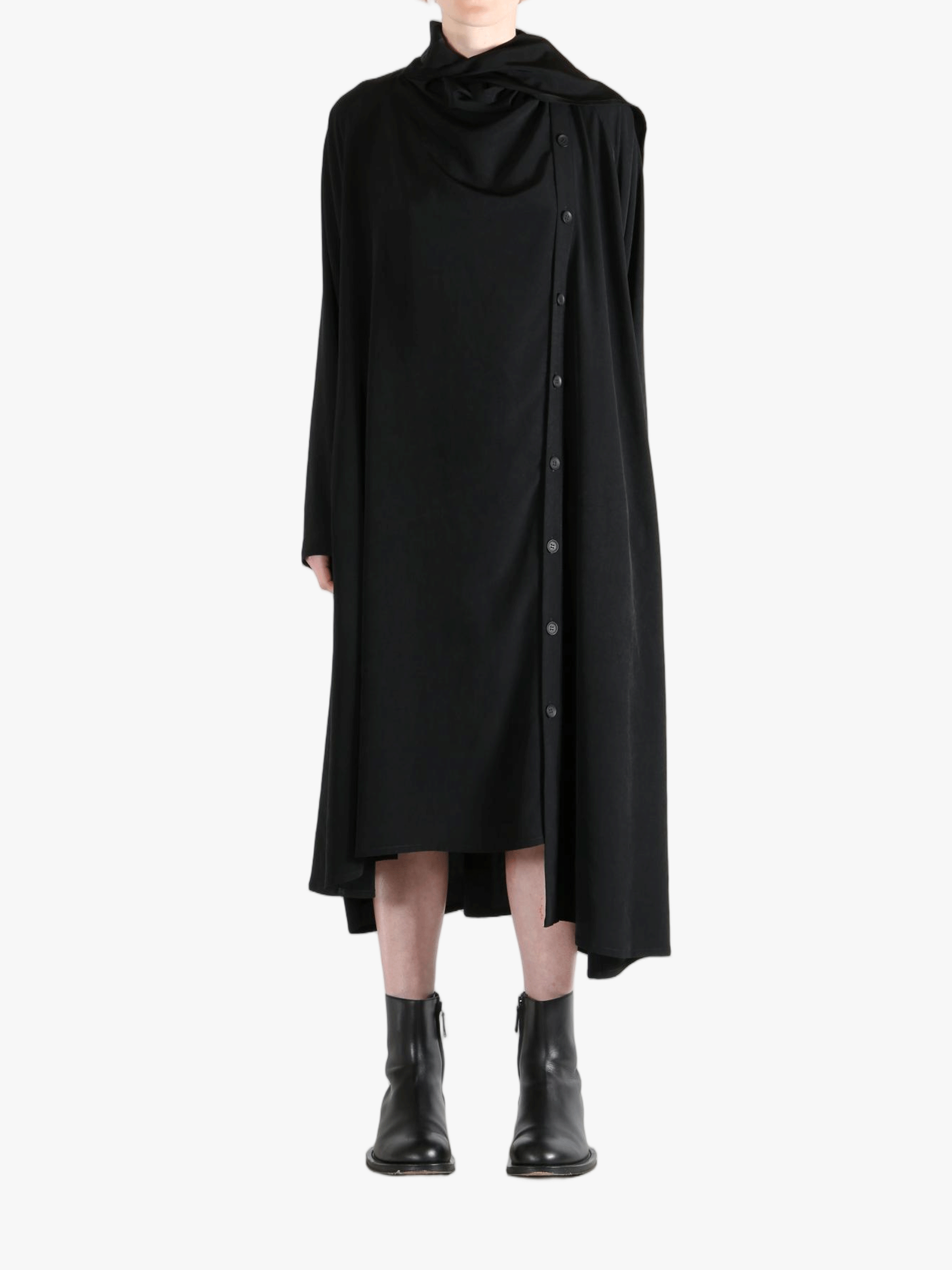 Black dress worn by a person, showing the dress' fit