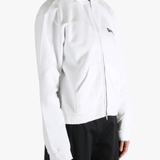 White hoodie worn by a person, showing the shirt's fit
