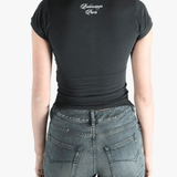 Black t-shirt worn by a person, showing the t-shirt's fit