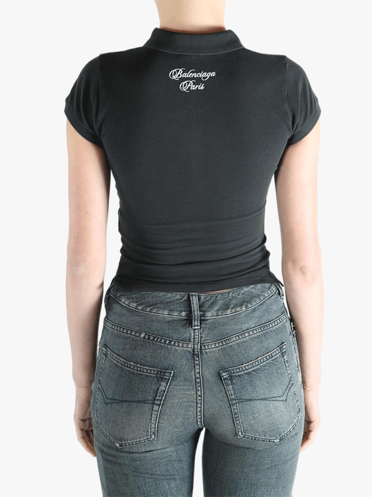 Black t-shirt worn by a person, showing the t-shirt's fit