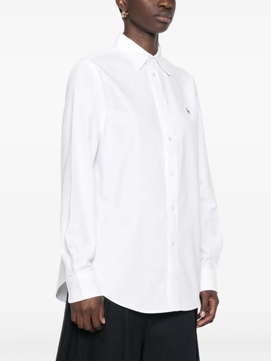 White shirt,worn by a person, showing the shirt's fit