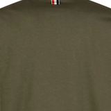 Close up of green t-shirt, showing texture of the Cotton fabric