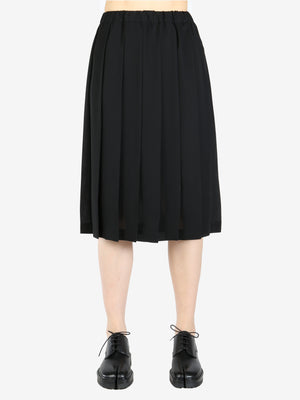 Black skirt worn by a person, showing the skirt's fit