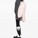 Close up of pink jackets-coats, showing texture of the polymide fabric