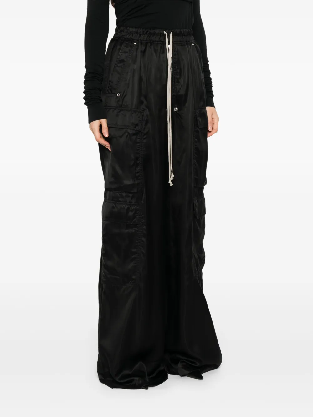 Black pant worn by a person, showing the pant's fit