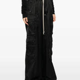 Black pant worn by a person, showing the pant's fit