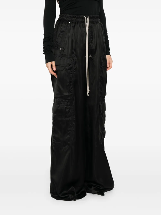 Black pant worn by a person, showing the pant's fit