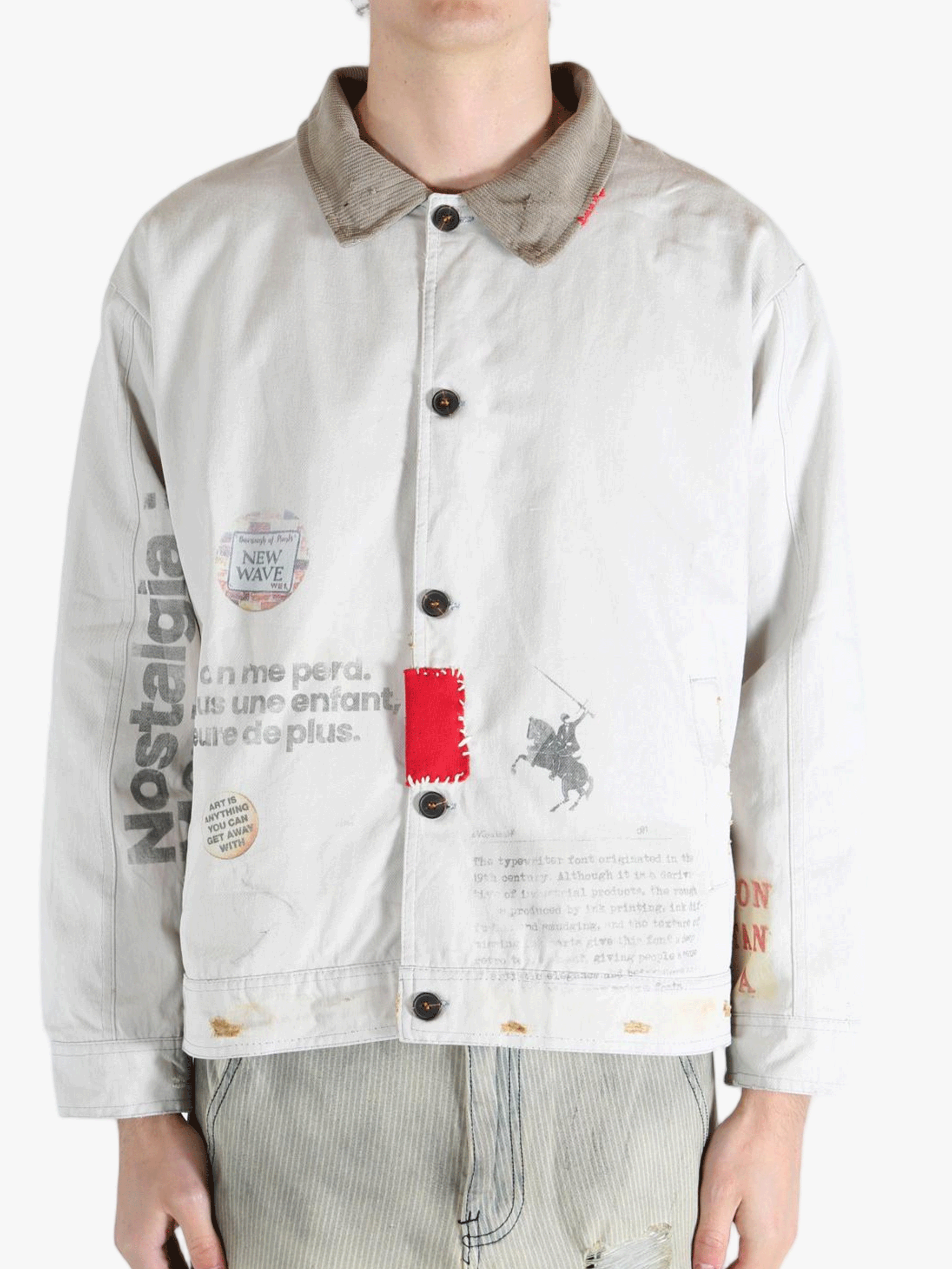 Grey jacket worn by a person, showing the jacket's fit