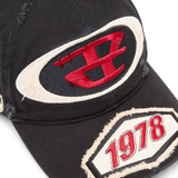 Close up of black hat,showing texture of the cotton fabric.