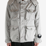 Grey jacket worn by a person, showing the jacket's fit