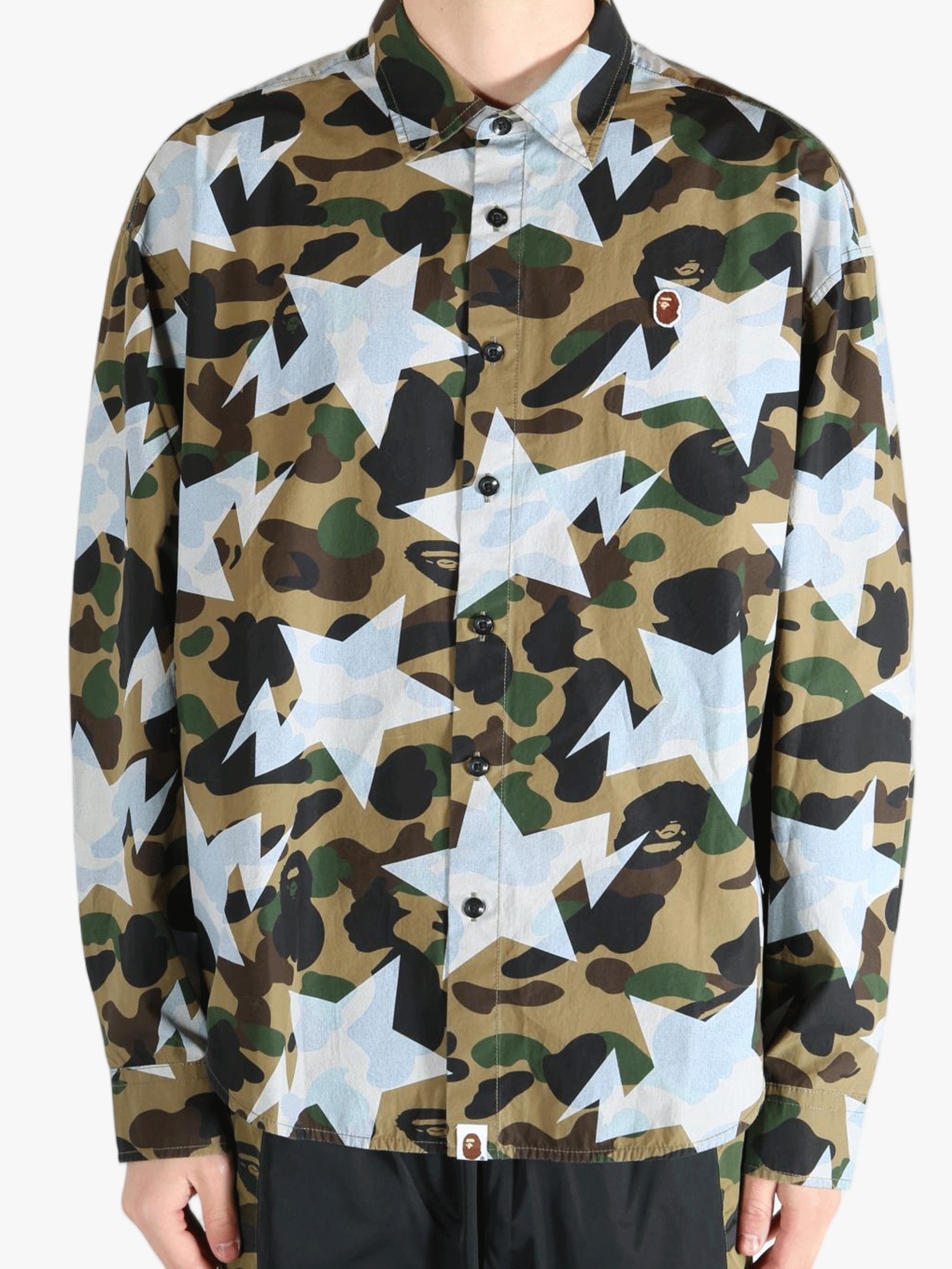 Green shirt worn by a person, showing the shirt's fit