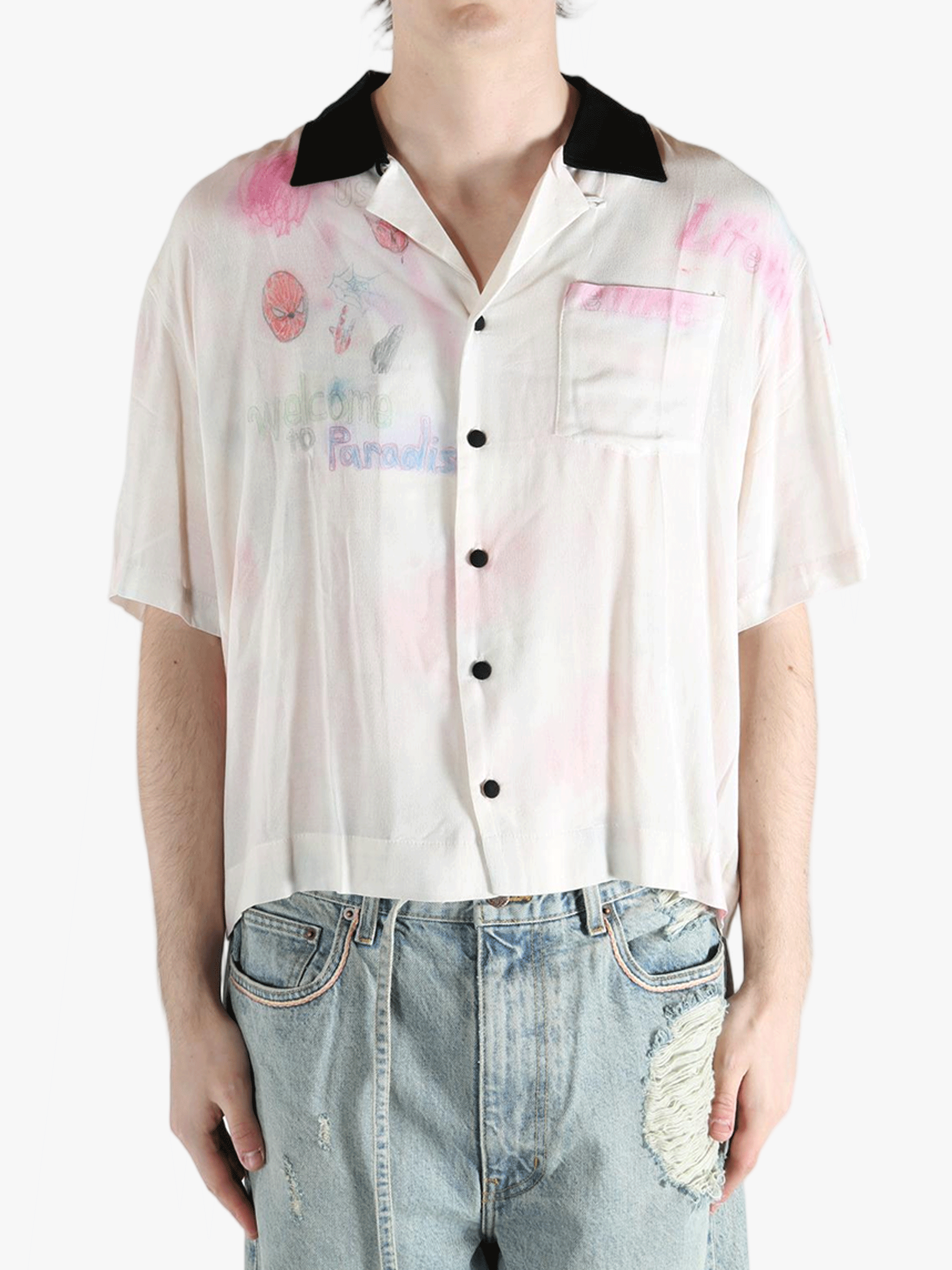 White shirt worn by a person, showing the shirt's fit