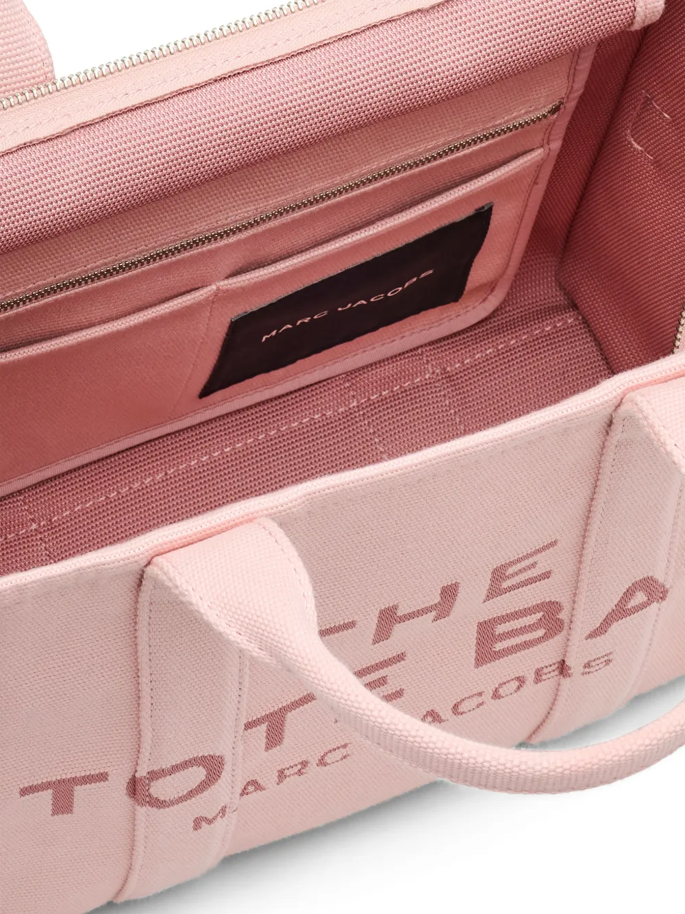 Close up of the pink bag, showing texture of the cotton fabric