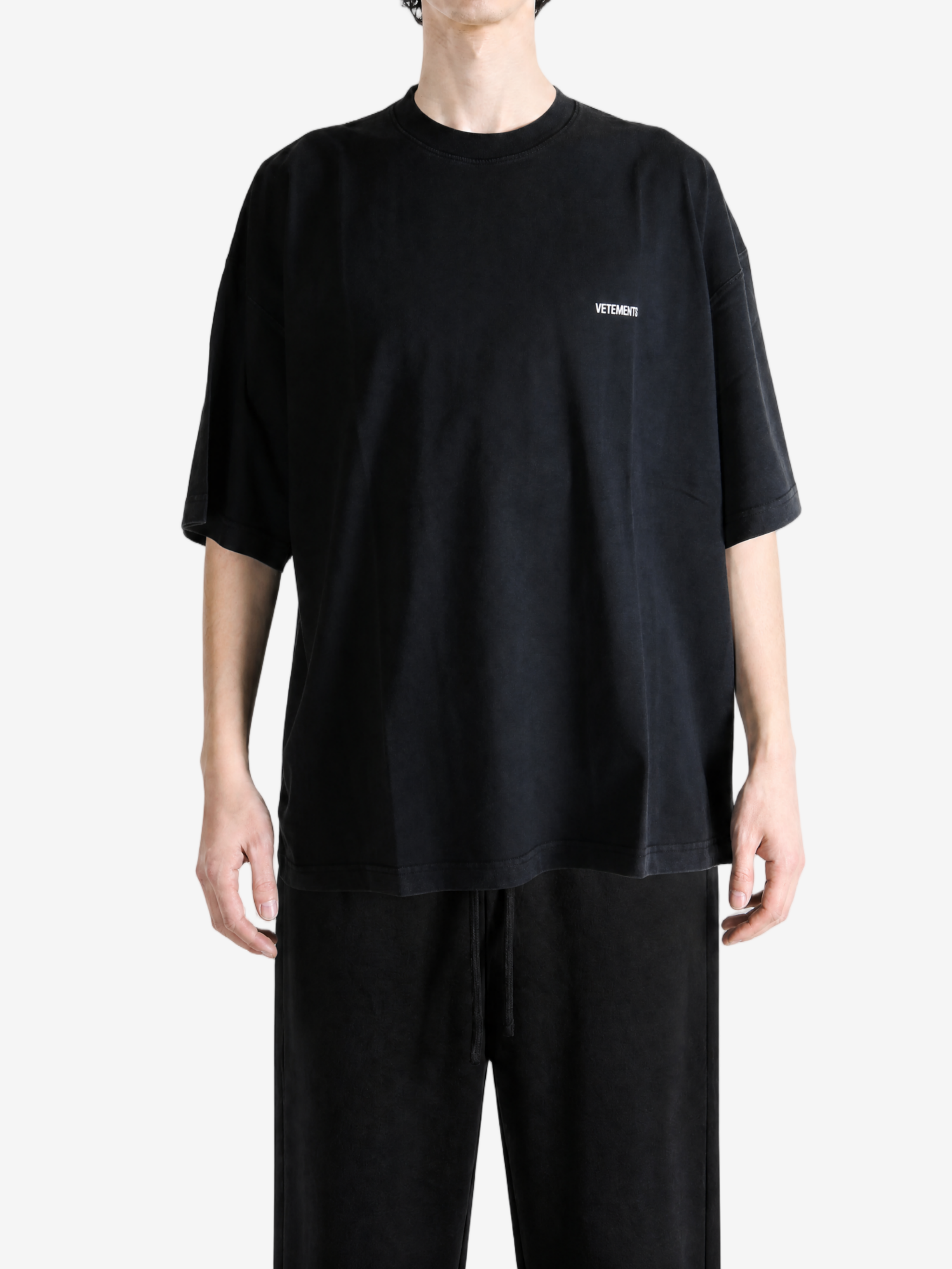 Black t-shirt, full body view