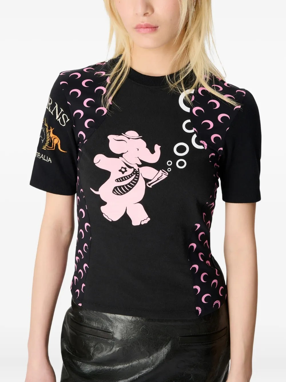 Black t-shirt worn by a person, showing the shirt's fit