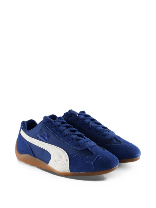 Blue sneakers, side view