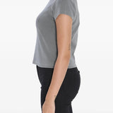 Grey t-shirt worn by a person, showing the shirt's fit