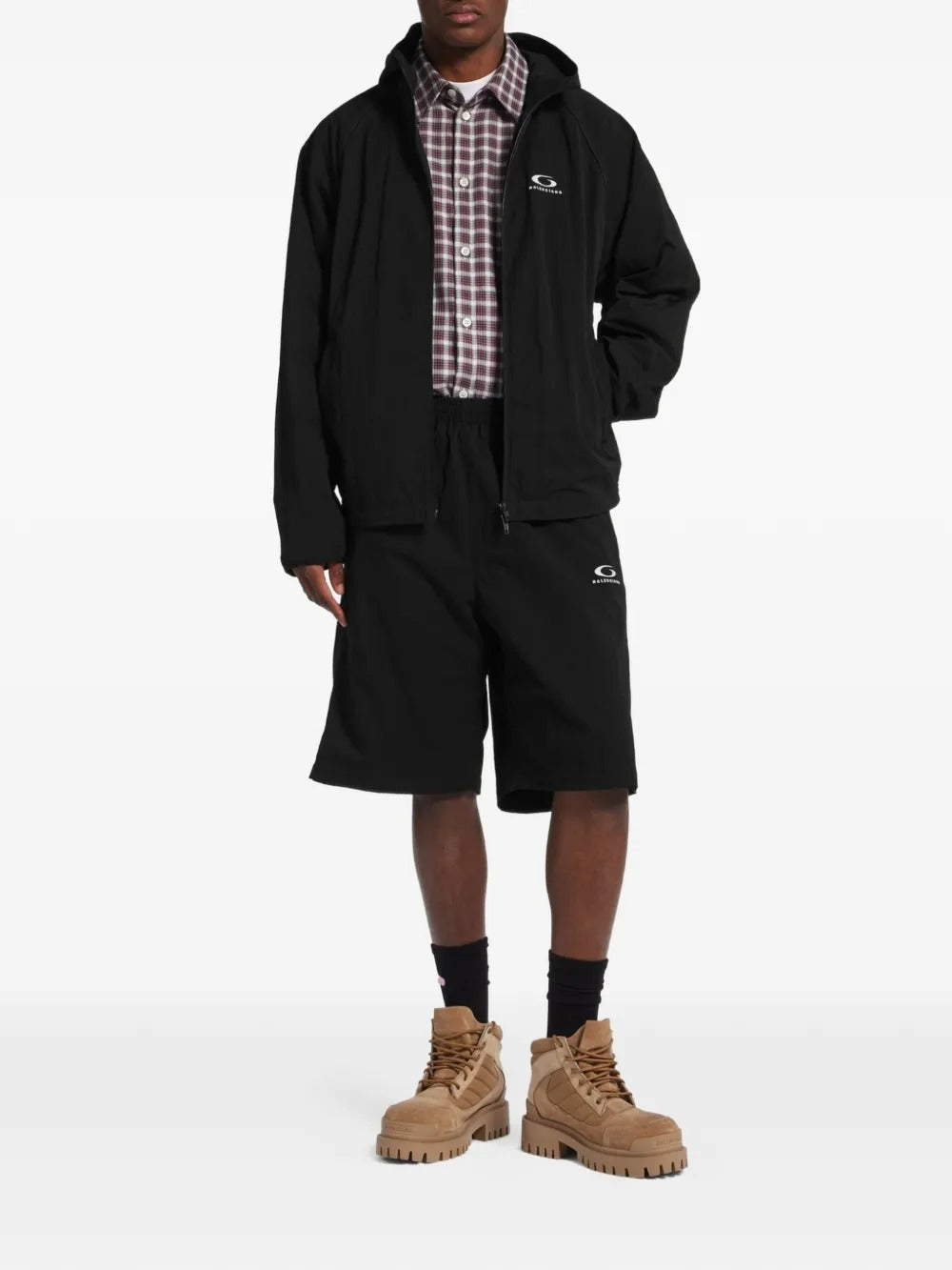 Black jacket worn by a person, showing the jacket's fit