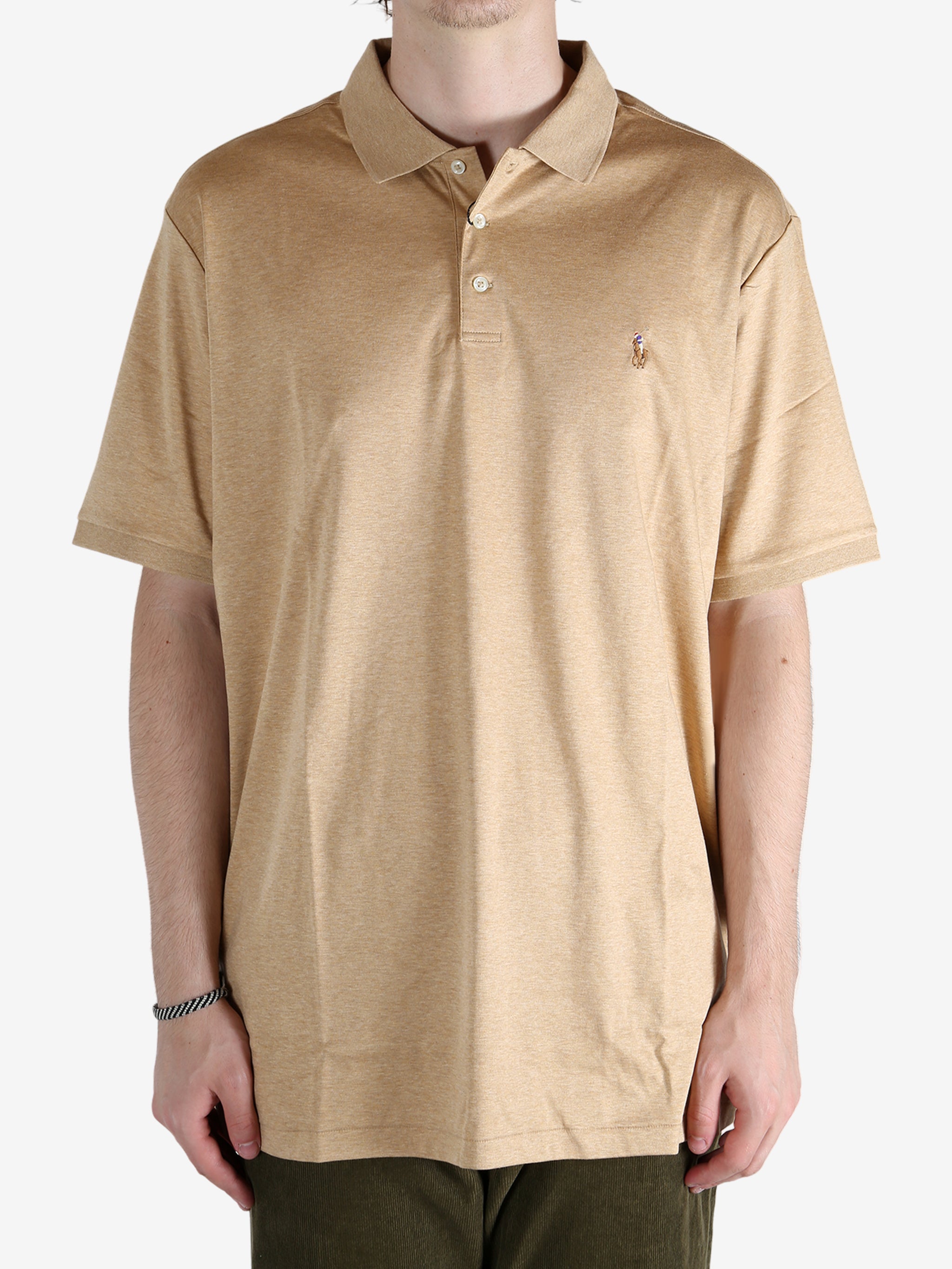 Tan t-shirt worn by a person, showing the shirt's fit