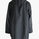Black jacket worn by a person, showing the jacket's fit