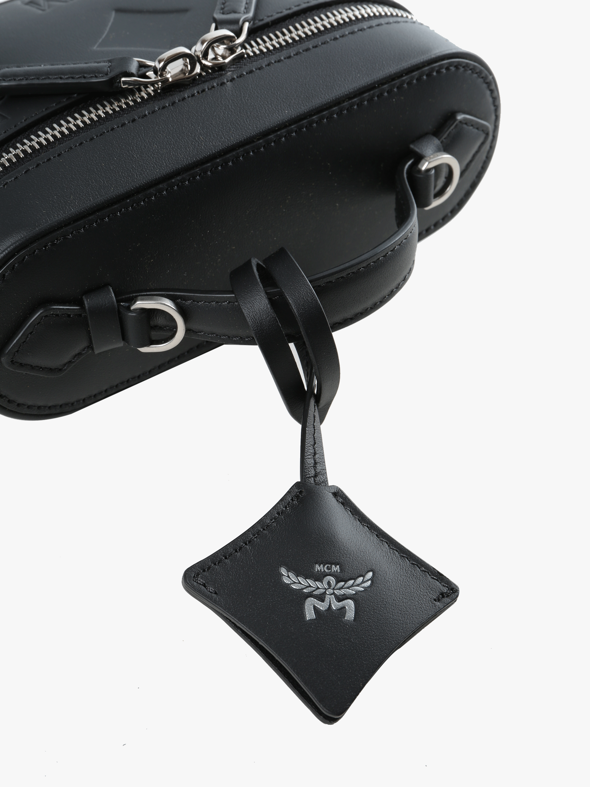 close up of black bags, showing texture of the cow leather fabric