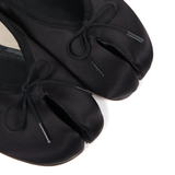 Close up of black flats, showing texture of the Cotton and  Acetate fabric