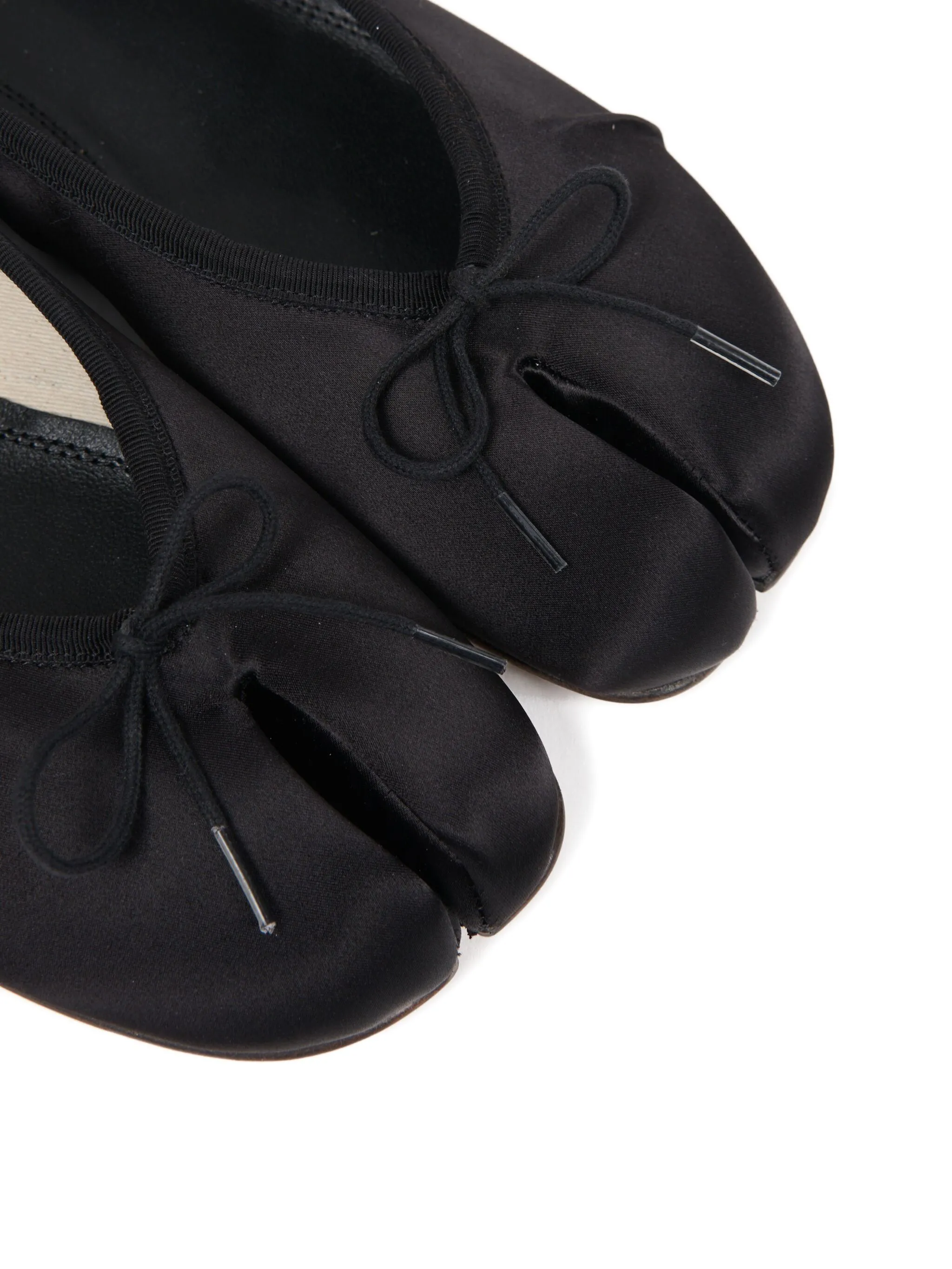 Close up of black flats, showing texture of the Cotton and  Acetate fabric