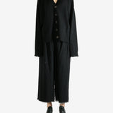 Black knitwear, full body view