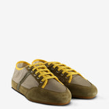 Tan sneakers, side view