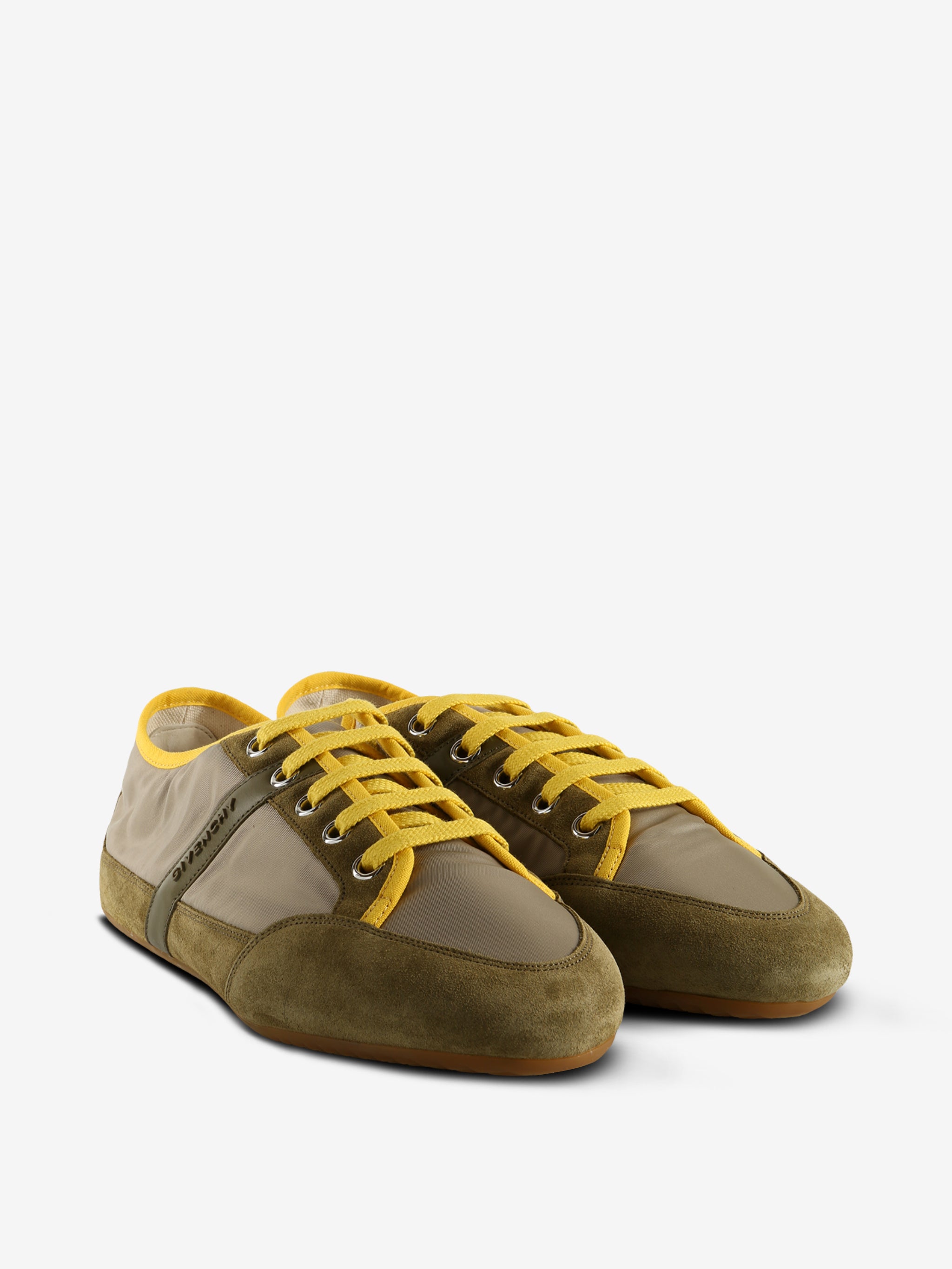 Tan sneakers, side view