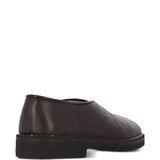 Brown flats, side view